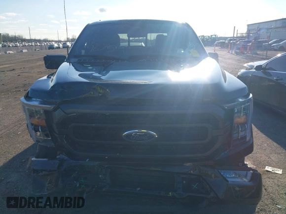 2023 Ford F-150 XL with VIN 1FTFW1E86PFA69635, listed as a IAAI auction lot 41885772 with 26,280 mi miles and . Bid and sale history available at carsss.com. Image 12.