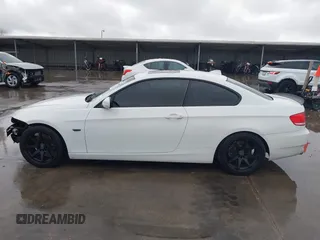 2010 BMW 3 Series 328i with VIN WBAWB3C57AP138864, listed as a IAAI auction lot 41507300 with 129,657 mi miles. Bid and sale history available at carsss.com. Image 15.