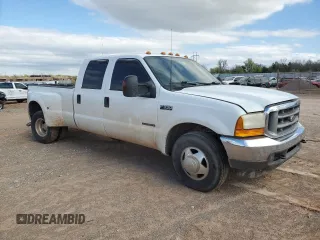 2001 Ford F-350 XL with VIN 1FTWW32F81EC66012, listed as a Copart auction lot 48225834 with 141,971 mi miles and Salvage title. Bid and sale history available at DreamBid. Image 4.