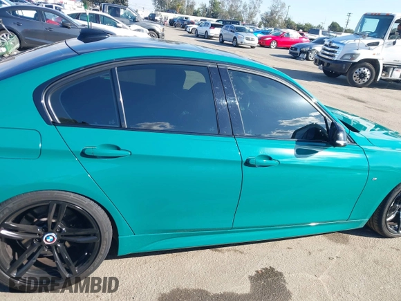 2014 BMW 3 Series 335i with VIN WBA3A9C52EF686470, listed as a IAAI auction lot 41411723 with 89,816 mi miles. Bid and sale history available at carsss.com. Image 13.