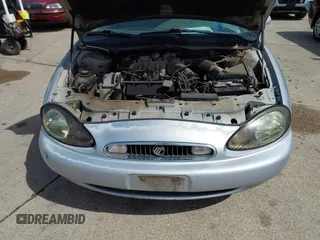 1998 Mercury Sable GS z VIN 1MEFM50U2WG637727, wystawiony jako IAAI lot #42316281 z przebiegiem 195 706 mil mil oraz . Historia ofert i sprzedaży dostępna na DreamBid. Obrazek 10.