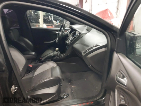 2014 Ford Focus ST with VIN 1FADP3L91EL375674, listed as a IAAI auction lot 41572329 with 100,253 mi miles and . Bid and sale history available at carsss.com. Image 5.