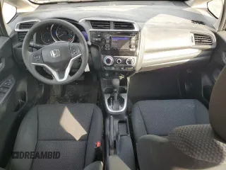 2019 Honda Fit LX z VIN 3HGGK5H41KM712693, wystawiony jako Copart lot #52069275 z przebiegiem 68 522 mil mil oraz Szkoda całkowita • Salvage title. Historia ofert i sprzedaży dostępna na DreamBid. Obrazek 8.