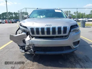 2020 Jeep Cherokee Latitude z VIN 1C4PJLCB3LD615147, wystawiony jako IAAI lot #42569825 z przebiegiem 128 952 mil mil oraz . Historia ofert i sprzedaży dostępna na DreamBid. Obrazek 6.