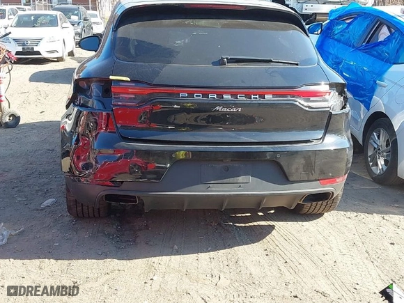 2019 Porsche Macan with VIN WP1AA2A51KLB01099, listed as a IAAI auction lot 40768646 with 77,725 mi miles. Bid and sale history available at carsss.com. Image 6.