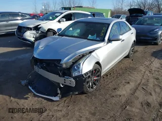 2018 Cadillac ATS RWD z VIN 1G6AA5RX7J0173114, wystawiony jako IAAI lot #41592867 z przebiegiem 50 393 mil mil oraz . Historia ofert i sprzedaży dostępna na DreamBid. Obrazek 2.