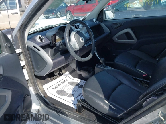 2015 Smart fortwo Passion z VIN WMEEJ3BA2FK790569, wystawiony jako IAAI lot #41598759 z przebiegiem 78 307 mil mil oraz . Historia ofert i sprzedaży dostępna na DreamBid. Obrazek 8.