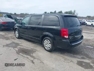 2017 Dodge Grand Caravan SE z VIN 2C4RDGBG3HR687183, wystawiony jako IAAI lot #41971615 z przebiegiem 158 201 mil mil oraz . Historia ofert i sprzedaży dostępna na DreamBid. Obrazek 3.