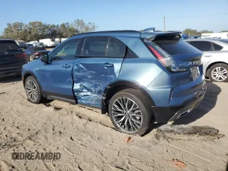 2024 Cadillac XT4 FWD Sport with VIN 1GYFZER40RF249101, listed as a Copart auction lot 76312304 with 1,969 mi miles and Salvage title. Bid and sale history available at DreamBid. Image 2.