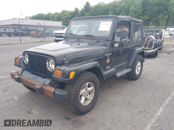 2001 Jeep Wrangler Sahara with VIN 1J4FA59S41P376079, listed as a IAAI auction lot 42739280 with 255,999 mi miles and . Bid and sale history available at DreamBid. Image 2.