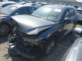 2020 Mazda CX-5 Grand Touring with VIN JM3KFADM7L0766278, listed as a IAAI auction lot 41297902 with 1 mi miles. Bid and sale history available at carsss.com. Image 2.