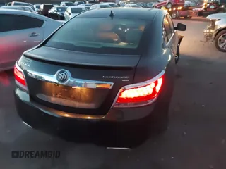 2011 Buick LaCrosse CXS with VIN 1G4GE5GD1BF158297, listed as a IAAI auction lot 41271158 with 104,659 mi miles and . Bid and sale history available at DreamBid. Image 4.