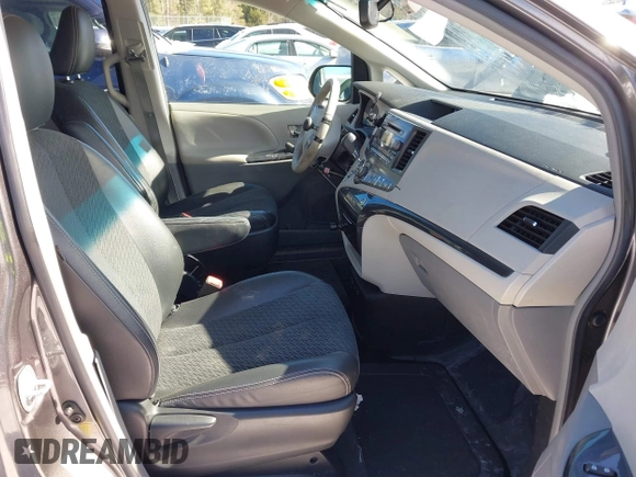 2012 Toyota Sienna SE with VIN 5TDXK3DC0CS233795, listed as a IAAI auction lot 41630513 with 102,766 mi miles. Bid and sale history available at carsss.com. Image 5.