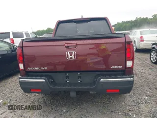 2020 Honda Ridgeline RTL-E with VIN 5FPYK3F7XLB012298, listed as a IAAI auction lot 42230880 with 48,252 mi miles and . Bid and sale history available at DreamBid. Image 16.