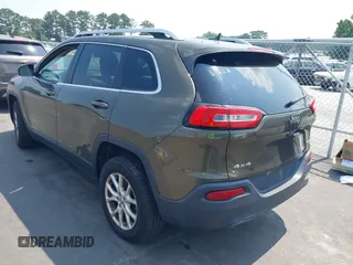 2015 Jeep Cherokee Latitude z VIN 1C4PJMCS9FW551694, wystawiony jako IAAI lot #42424992 z przebiegiem 125 852 mil mil oraz . Historia ofert i sprzedaży dostępna na DreamBid. Obrazek 3.