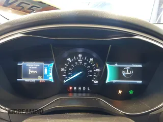 2013 Ford Fusion SE Hybrid with VIN 3FA6P0LU5DR303873, listed as a IAAI auction lot 41074370 with 193,372 mi miles and . Bid and sale history available at DreamBid. Image 7.