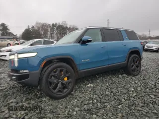 2023 Rivian R1S Launch Edition z VIN 7PDSGABL4PN006987, wystawiony jako Copart lot #47730665 z przebiegiem 29 299 mil mil oraz Szkody całkowita. Historia ofert i sprzedaży dostępna na DreamBid. Obrazek 1.