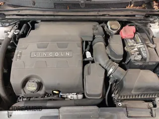 2013 Lincoln MKS с VIN 1LNHL9EK3DG615529, выставлен на аукционе IAAI как лот 42288732 с пробегом 135 876 миль миль и . История ставок и продаж доступна на DreamBid. Изображение 10.