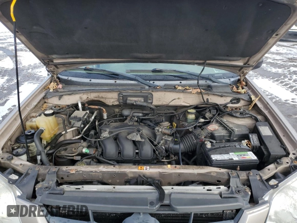 2001 Mazda Tribute LX with VIN 4F2CU081X1KM70119, listed as a Copart auction lot 89311935 with 176,851 mi miles and Salvage Title. Bid and sale history available at DreamBid. Image 12.