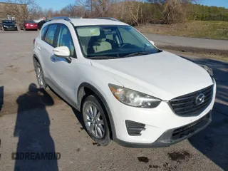 2016 Mazda CX-5 Sport with VIN JM3KE4BY8G0605504, listed as a IAAI auction lot 41866173 with 91,797 mi miles. Bid and sale history available at carsss.com. Image 1.