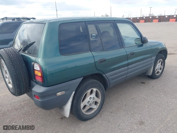 1998 Toyota RAV4 with VIN JT3GP10V5W0026814, listed as a IAAI auction lot 42003456 with 196,842 mi miles. Bid and sale history available at carsss.com. Image 4.
