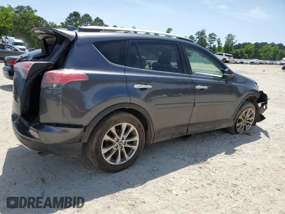 2016 Toyota RAV4 Limited z VIN JTMDFREVXGJ076533, wystawiony jako Copart lot #57480995 z przebiegiem 124 626 mil mil oraz Szkoda całkowita • Salvage title. Historia ofert i sprzedaży dostępna na DreamBid. Obrazek 3.