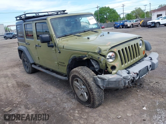 2013 Jeep Wrangler Unlimited Sport z VIN 1C4BJWDG0DL577812, wystawiony jako IAAI lot #42301104 z przebiegiem 138 387 mil mil oraz . Historia ofert i sprzedaży dostępna na DreamBid. Obrazek 1.