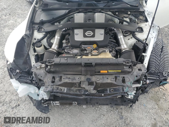2017 Nissan 370Z z VIN JN1AZ4EH9HM952650, wystawiony jako Copart lot #49354135 z przebiegiem 62 141 mil mil oraz Szkoda całkowita • Salvage title. Historia ofert i sprzedaży dostępna na DreamBid. Obrazek 11.