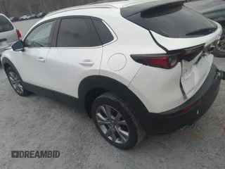 2021 Mazda CX-30 Premium with VIN 3MVDMADL5MM318729, listed as a IAAI auction lot 41645560 with 51,132 mi miles and . Bid and sale history available at DreamBid. Image 3.