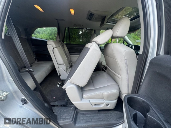 2018 Honda Pilot Touring z VIN 5FNYF6H94JB070661, wystawiony jako Copart lot #60926415 z przebiegiem 205 538 mil mil oraz Czysty tytuł • Clean title. Historia ofert i sprzedaży dostępna na DreamBid. Obrazek 13.