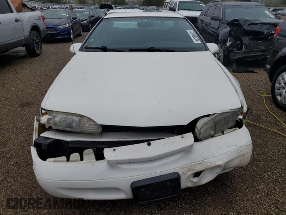 1994 Ford Thunderbird LX with VIN 1FALP62W5RH211700, listed as a Copart auction lot 72046634 with 61,570 mi miles and Salvage Title. Bid and sale history available at DreamBid. Image 5.