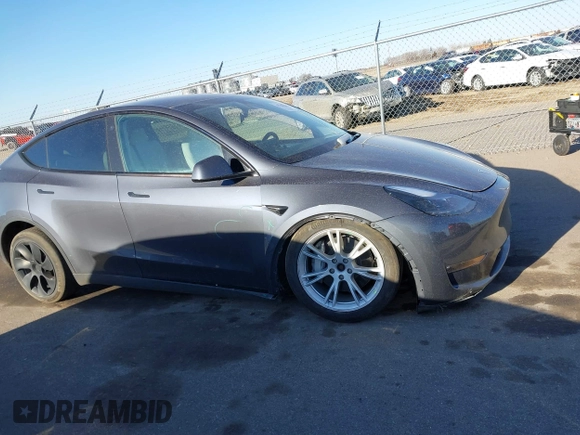 2023 Tesla Model Y Long Range with VIN 7SAYGAEEXPF714760, listed as a IAAI auction lot 41748398 with 49,802 mi miles and . Bid and sale history available at DreamBid. Image 14.
