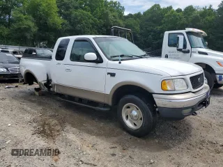 2001 Ford F-150 XL with VIN 1FTRX08L51KE49004, listed as a Copart auction lot 60470745 with 199,490 mi miles and Salvage title. Bid and sale history available at DreamBid. Image 4.