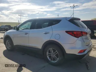 2018 Hyundai Santa Fe 2.4L z VIN 5XYZTDLB7JG572441, wystawiony jako Copart lot #52810145 z przebiegiem 106 578 mil mil oraz Szkoda całkowita • Salvage title. Historia ofert i sprzedaży dostępna na DreamBid. Obrazek 2.