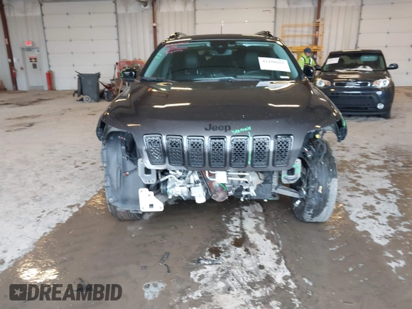 2023 Jeep Cherokee Altitude Lux with VIN 1C4PJMMB7PD107404, listed as a IAAI auction lot 41458661 with 30,683 mi miles. Bid and sale history available at carsss.com. Image 6.