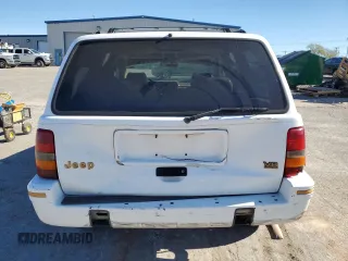1995 Jeep Grand Cherokee Limited with VIN 1J4GZ78Y1SC529220, listed as a Copart auction lot 81247084 with 138,292 mi miles and Salvage Title. Bid and sale history available at carsss.com. Image 6.