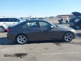 2014 BMW 3 Series 328i with VIN WBA3C1C57EK116483, listed as a IAAI auction lot 42697759 with 113,010 mi miles and . Bid and sale history available at DreamBid. Image 14.