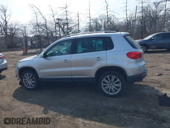 2012 Volkswagen Tiguan S z VIN WVGBV7AX9CW571627, wystawiony jako IAAI lot #41710871 z przebiegiem 157 998 mil mil oraz . Historia ofert i sprzedaży dostępna na DreamBid. Obrazek 14.