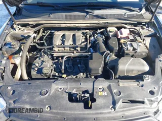 2015 Ford Taurus Limited with VIN 1FAHP2J85FG165823, listed as a IAAI auction lot 41315889 with 134,165 mi miles. Bid and sale history available at carsss.com. Image 10.