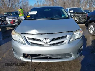 2011 Toyota Corolla L with VIN JTDBU4EE8B9167374, listed as a IAAI auction lot 41312318 with 189,903 mi miles. Bid and sale history available at carsss.com. Image 6.