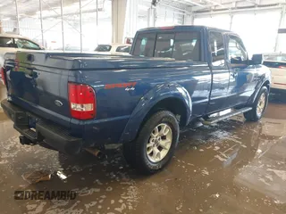 2011 Ford Ranger XLT with VIN 1FTLR4FE3BPA52049, listed as a IAAI auction lot 41394422 with 112,080 mi miles. Bid and sale history available at carsss.com. Image 4.