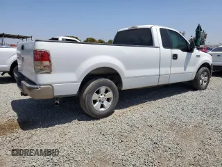 2005 Ford F-150 XL with VIN 1FTRF12255NB53669, listed as a Copart auction lot 61636135 with 156,562 mi miles and Salvage title. Bid and sale history available at DreamBid. Image 3.