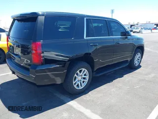 2015 Chevrolet Tahoe Commercial z VIN 1GNLC2EC0FR629983, wystawiony jako IAAI lot #42825604 z przebiegiem 112 410 mil mil oraz . Historia ofert i sprzedaży dostępna na DreamBid. Obrazek 4.