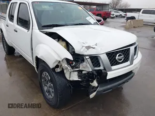 2014 Nissan Frontier SV with VIN 1N6AD0ER6EN751448, listed as a IAAI auction lot 41514633 with 238,204 mi miles and . Bid and sale history available at DreamBid. Image 6.