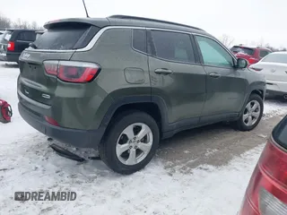 2018 Jeep Compass Altitude with VIN 3C4NJDBB1JT479462, listed as a IAAI auction lot 41276119 with 58,895 mi miles and . Bid and sale history available at carsss.com. Image 4.