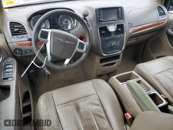 2012 Chrysler Town & Country Touring with VIN 2C4RC1BG9CR412507, listed as a Copart auction lot 63881804 with 144,557 mi miles and Salvage Title. Bid and sale history available at DreamBid. Image 8.