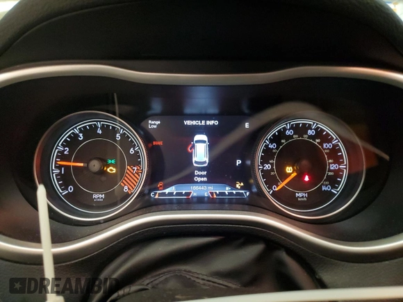 2015 Jeep Cherokee Trailhawk z VIN 1C4PJMBS8FW665607, wystawiony jako Copart lot #51536715 z przebiegiem 166 443 mil mil oraz Szkoda całkowita • Salvage title. Historia ofert i sprzedaży dostępna na DreamBid. Obrazek 9.