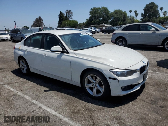 2015 BMW 3 Series 328i with VIN WBA3C1C56FK122177, listed as a Copart auction lot 57333625 with 102,399 mi miles and Salvage title. Bid and sale history available at DreamBid. Image 4.