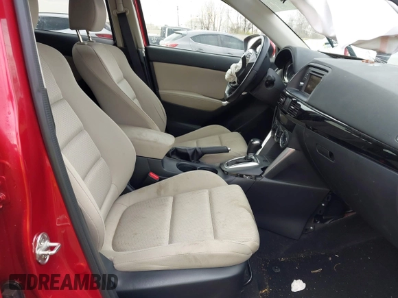 2014 Mazda CX-5 Touring with VIN JM3KE2CY4E0411780, listed as a IAAI auction lot 41903570 with 103,658 mi miles and . Bid and sale history available at DreamBid. Image 5.