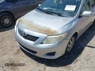 2009 Toyota Corolla with VIN JTDBL40E99J010861, listed as a IAAI auction lot 42143607 with 333,838 mi miles and . Bid and sale history available at DreamBid. Image 6.